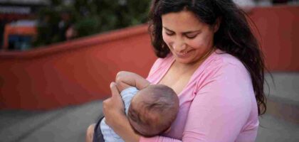 A mother breastfeeding her baby.
